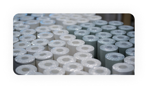 Worker drawing on plans