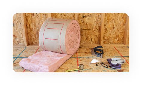 Worker drawing on plans