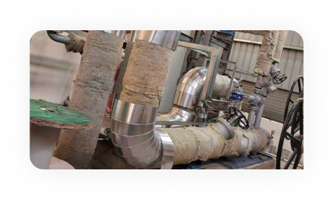 Worker drawing on plans