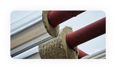 Worker drawing on plans