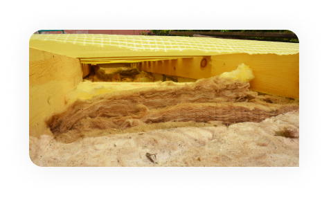 Worker drawing on plans